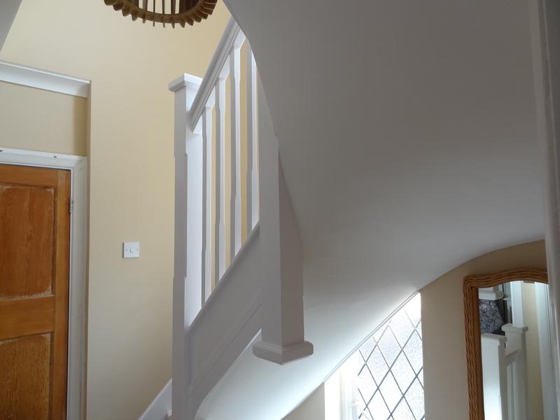 New landing with a painted balustrade, square newel posts and a moulded handrail