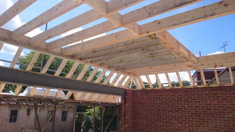 New roof structure over a rear extension with four rooflight openings framed out